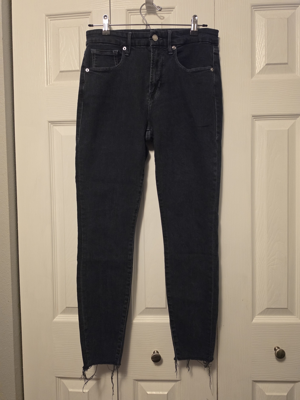 Good American Black Skinny Jeans with Raw Hem